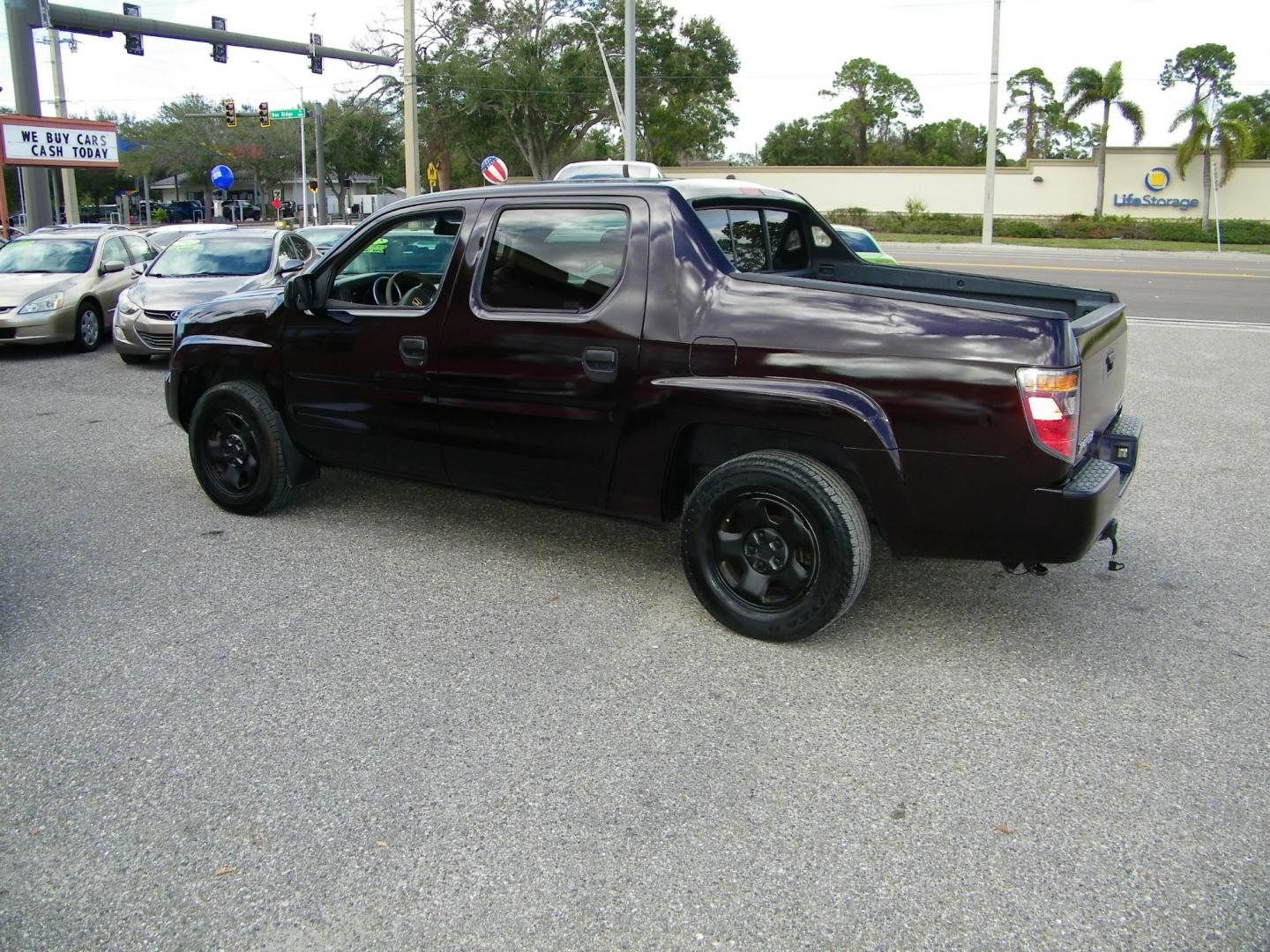 2007 Maroon /Grey Honda Ridgeline RT (2HJYK16267H) with an 3.5L V6 SOHC 24V engine, 5-Speed Automatic Overdrive transmission, located at 4000 Bee Ridge Road, Sarasota, FL, 34233, (941) 926-0300, 27.298664, -82.489151 - Photo#3